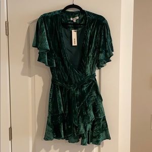 Emerald green velvet dress